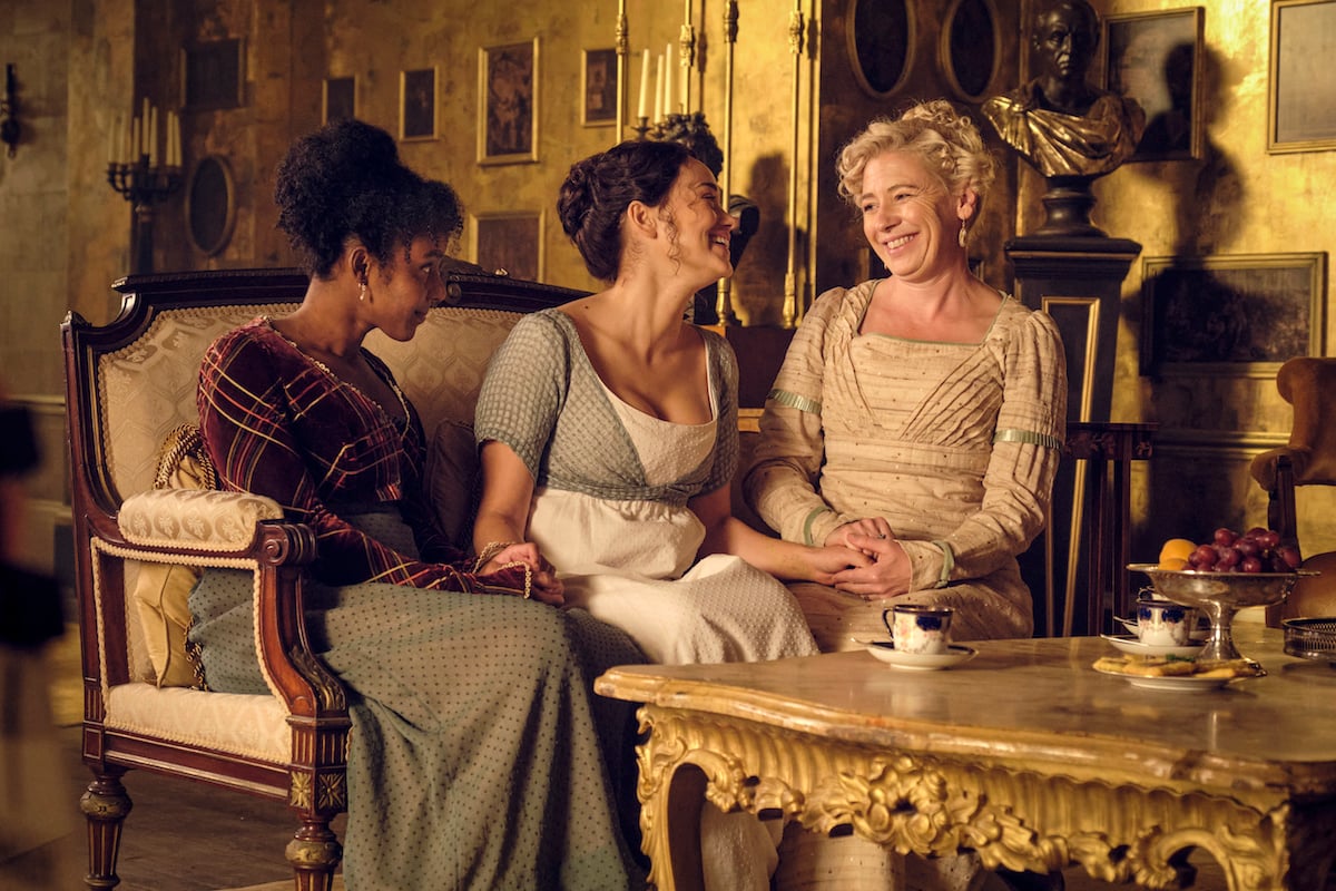 Georgiana, Charlotte and Mary sitting on a couch in 'Sanditon' Season 2 Episode 6