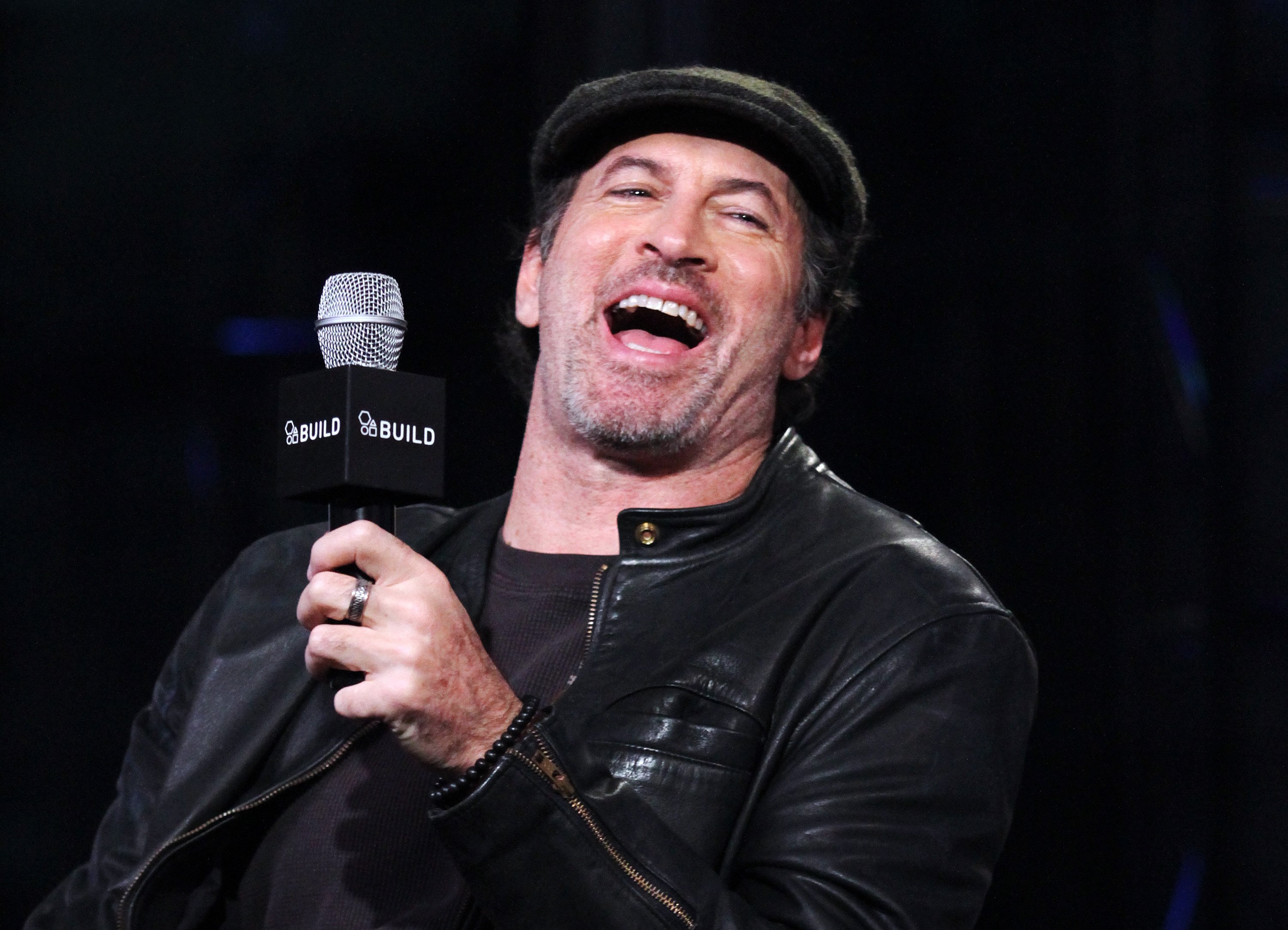 Scott Patterson sits on stage to discuss 'Gilmore Girls: A Year in the Life'