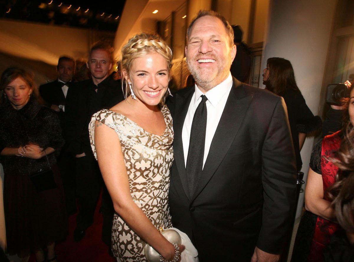 Sienna Miller and Harvey Weinstein pose for a photo together in 2007