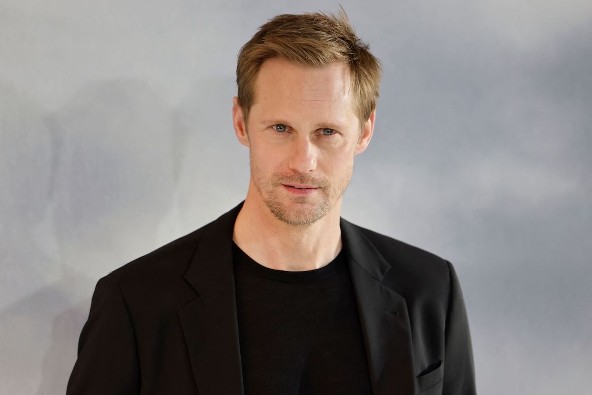 'The Northman' star Alexander Skarsgård wears black and poses