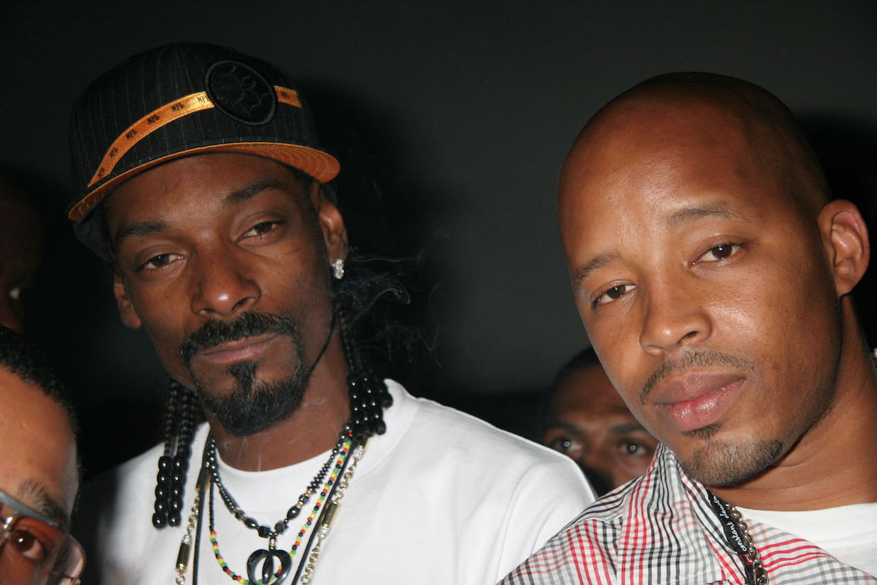 Snoop Dogg and Warren G pose for photo - Warren was once affiliated with Death Row Records but his relationship with Knight soured 