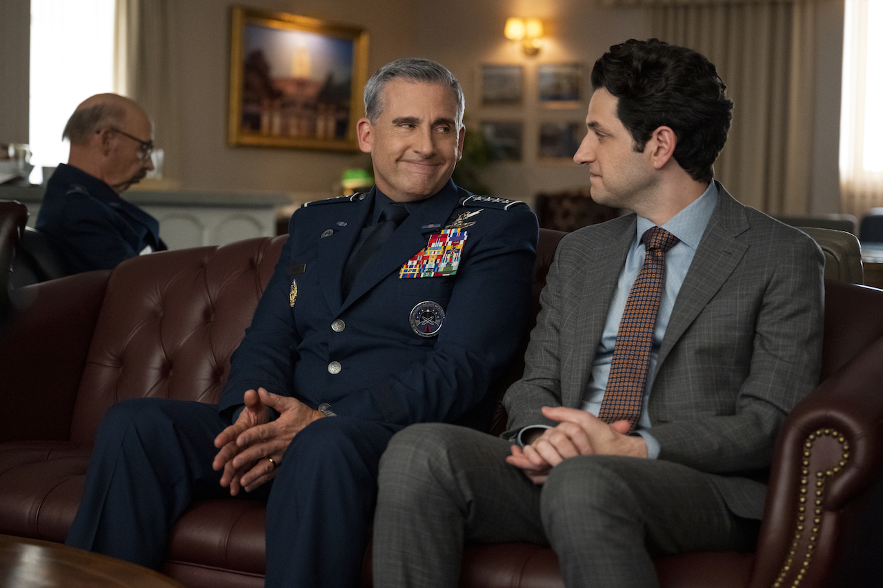 Gen. Mark Naird (Steve Carell) and F. Tony Scarapiducci (Ben Schwartz) look on in 'Space Force' Season 2. 