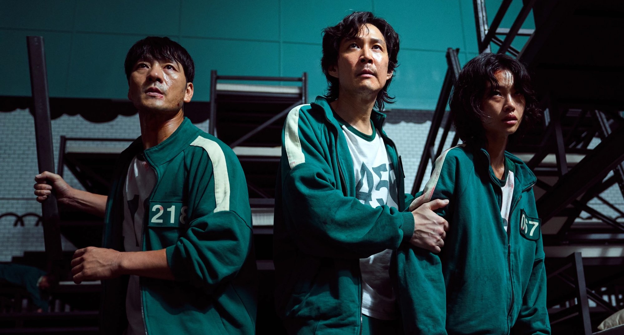 'Squid Game' K-drama main characters wearing green tracksuits in relation to second seasons.