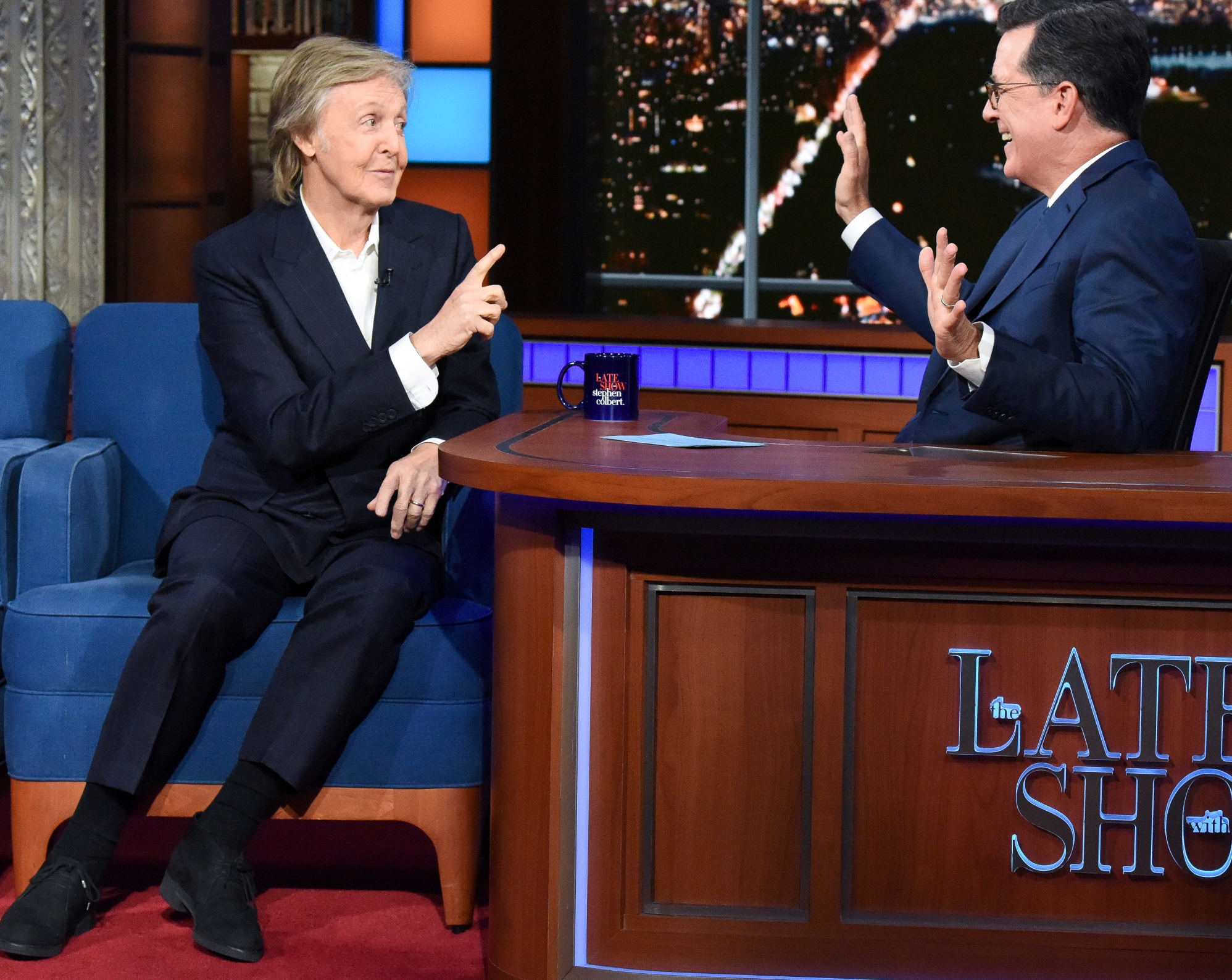 Paul McCartney pointing at Stephen Colbert