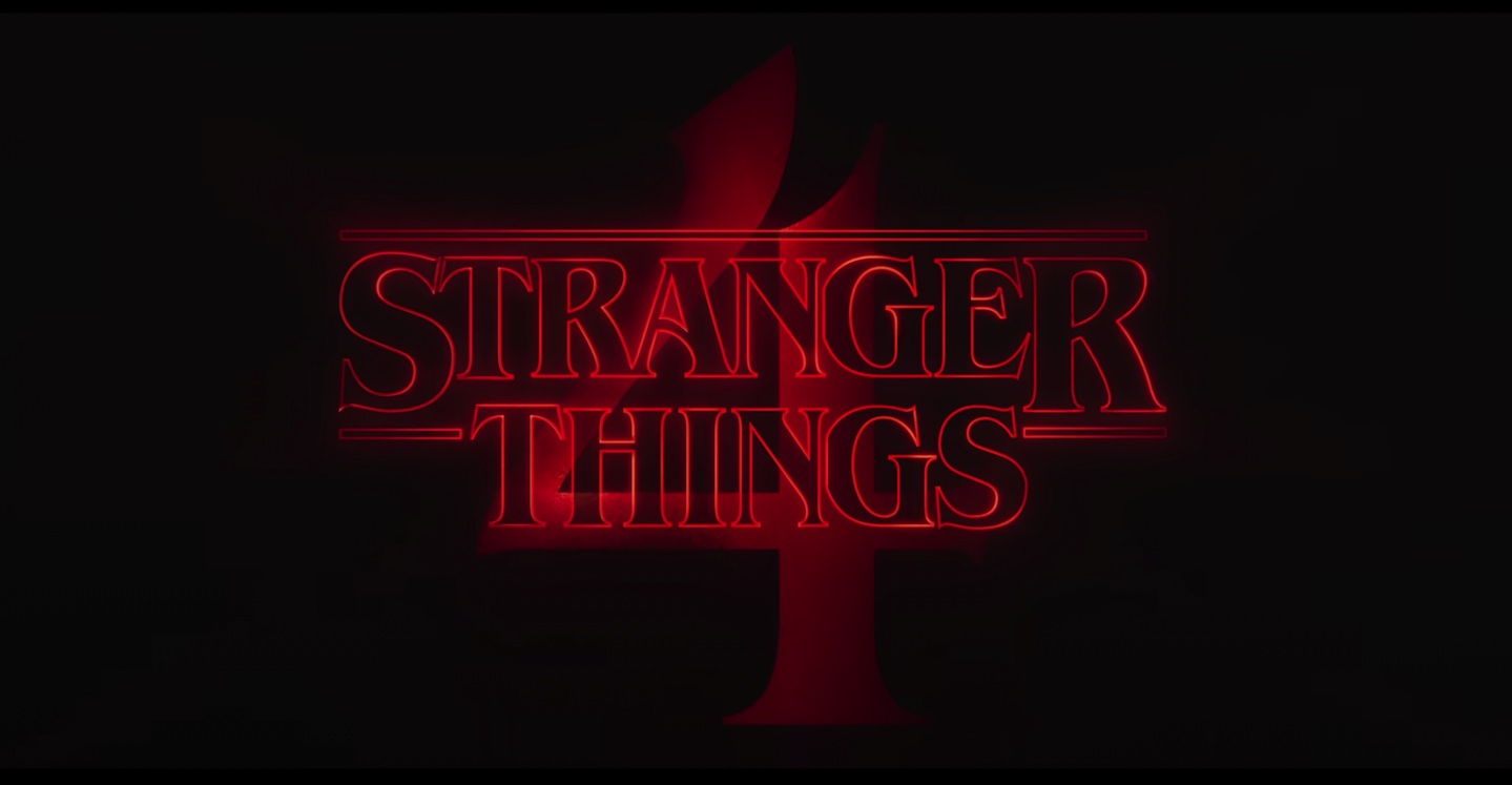 'Stranger Things 4' logo written in red font on a black background. Logan Riley Bruner plays Fred Benson in the upcoming season.