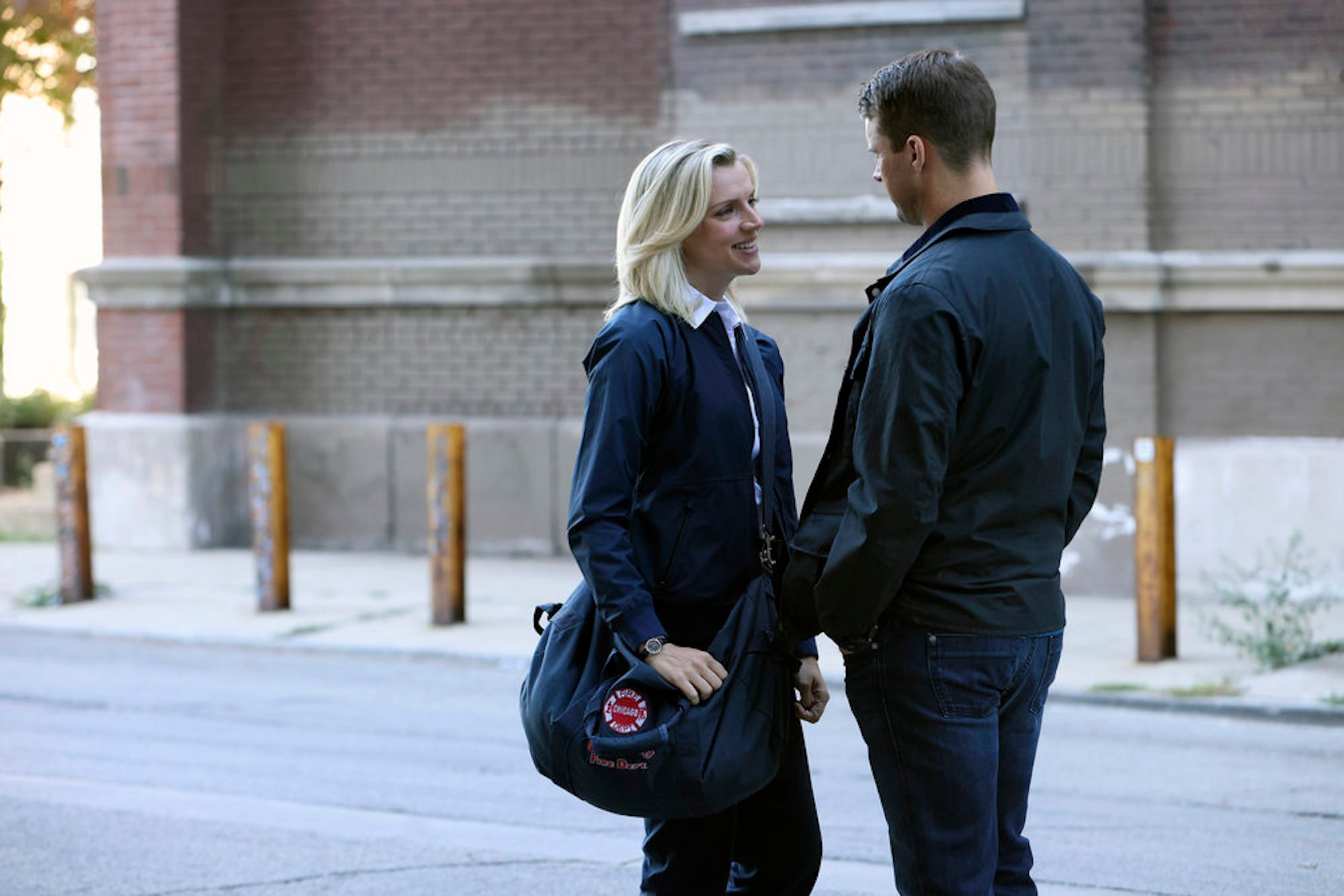 Matt Casey and Sylvie Brett talking to each other closely in 'Chicago Fire' Season 10