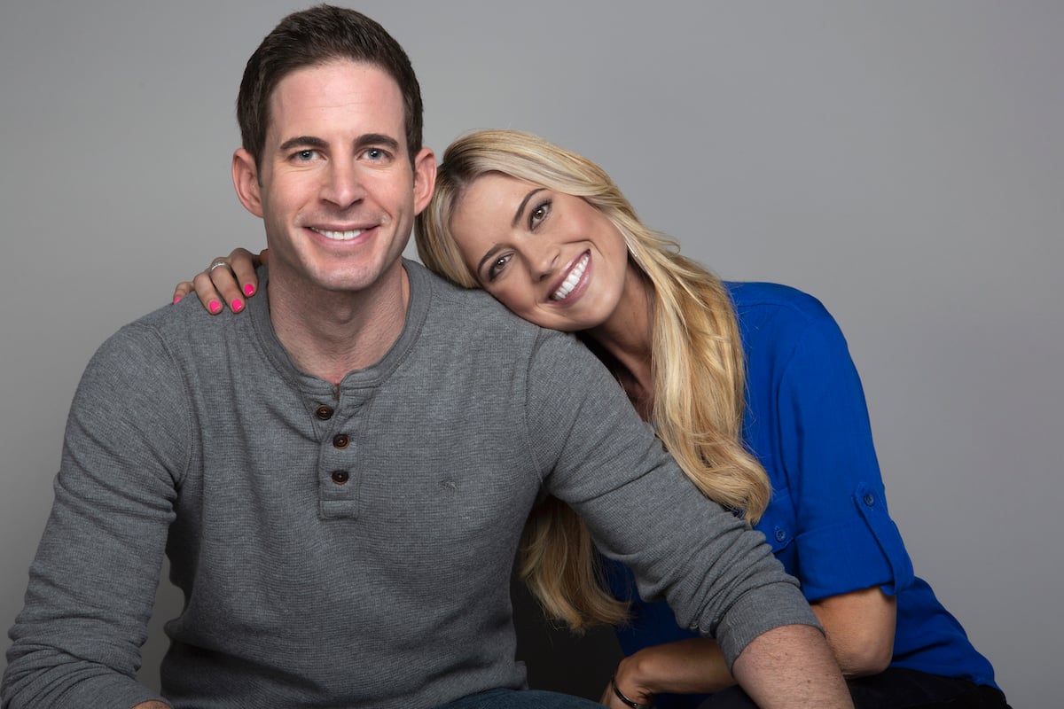 Tarek El Moussa and Christina Haack smile and pose together.