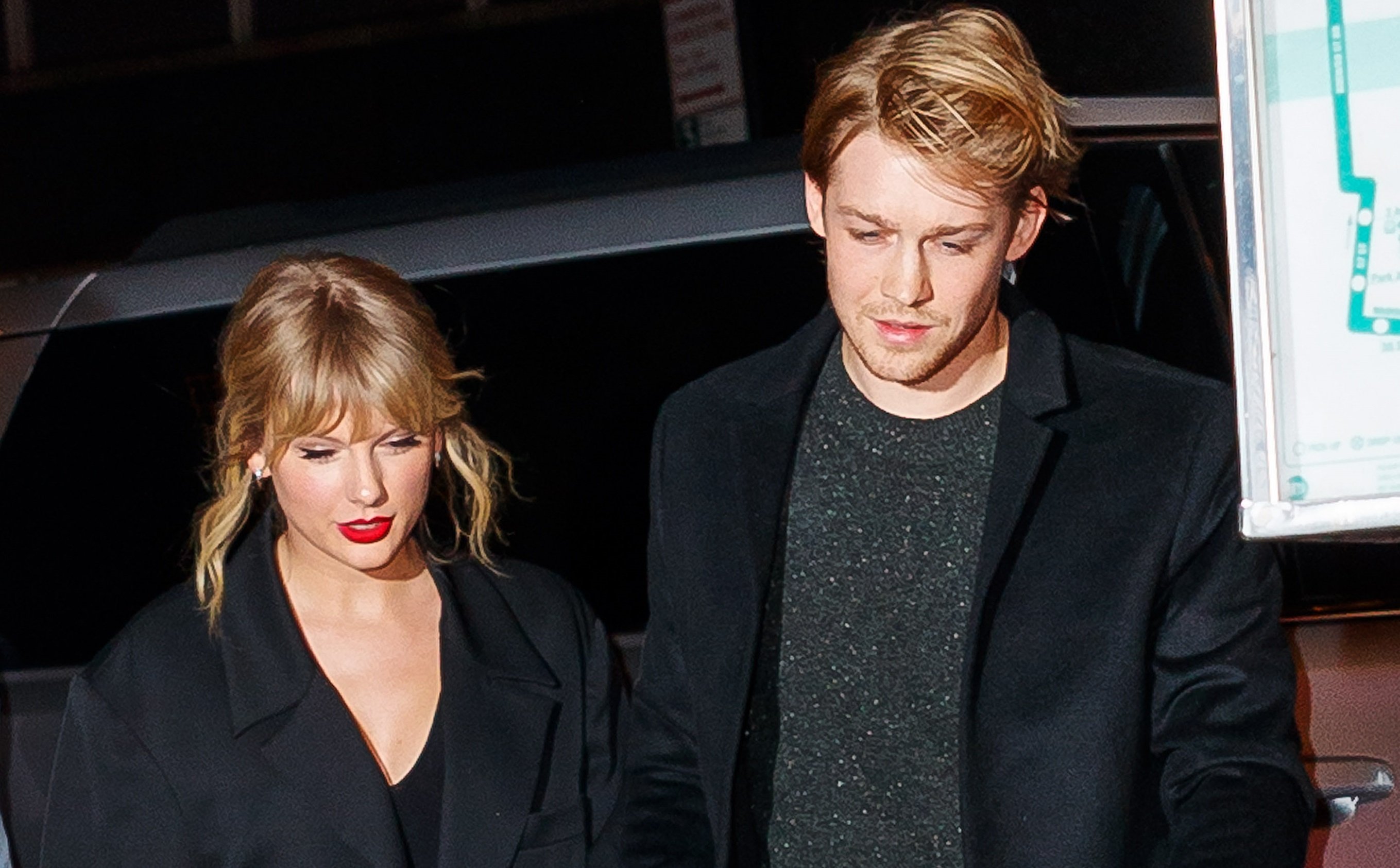Taylor Swift and Joe Alwyn walking together in 2019