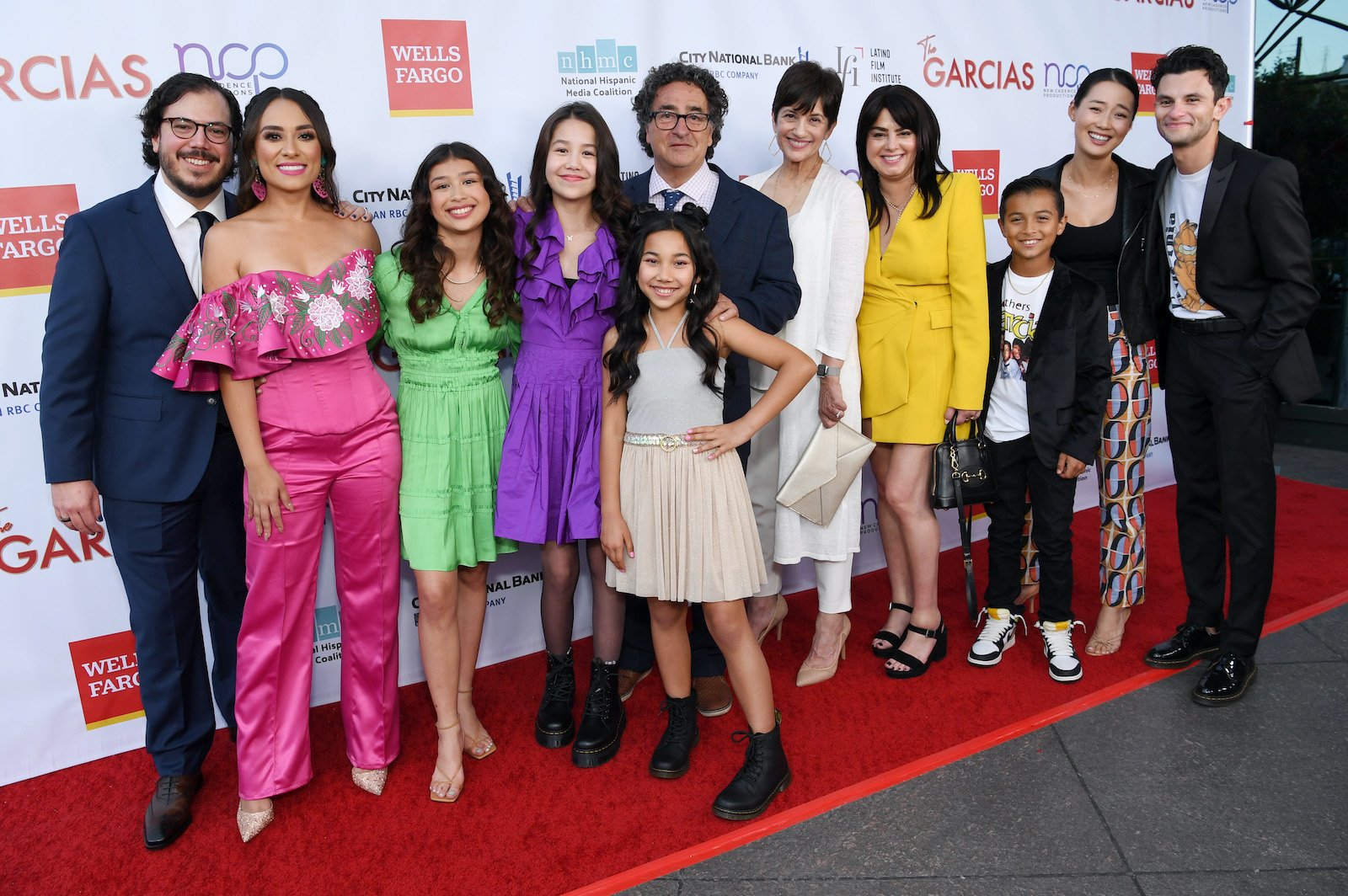 'The Garcias' cast smile on the step and repeat during the premiere event of 'The Garcias'