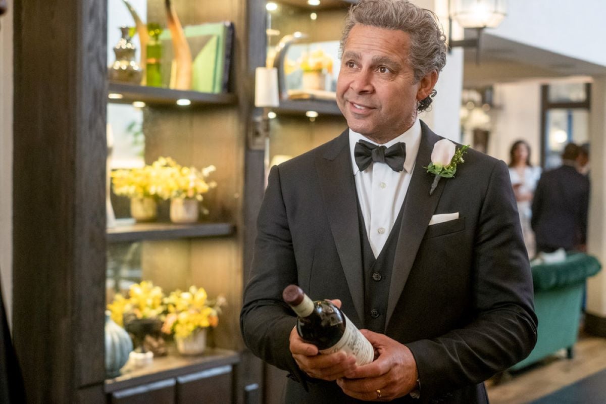 Jon Huertas, in character as Miguel, wears a black tux in 'This Is Us' Season 6 Episode 13.