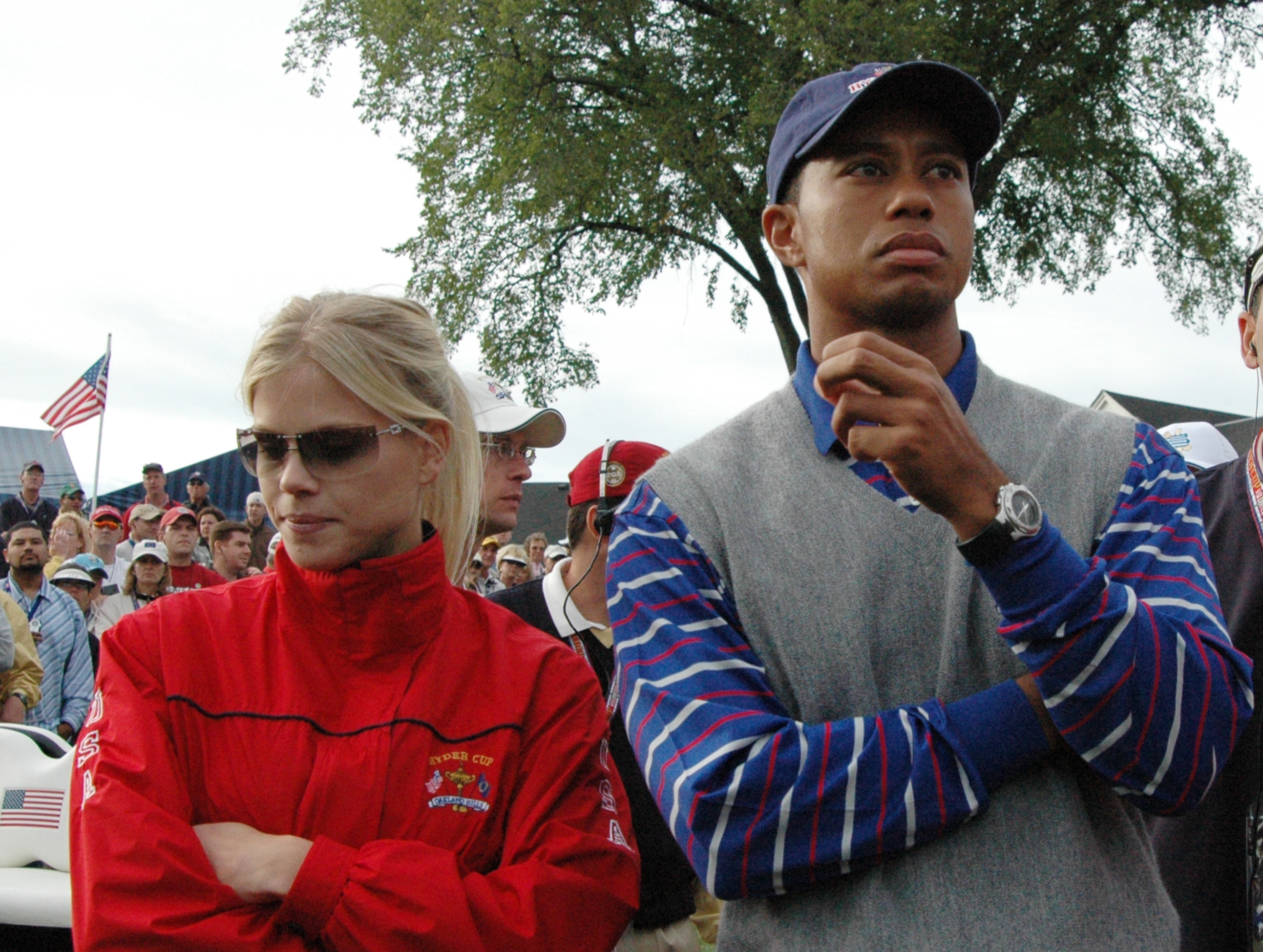 Tiger Woods standing next to his ex-wife, Elin Nordegren, at the 2004 Ryder Cup