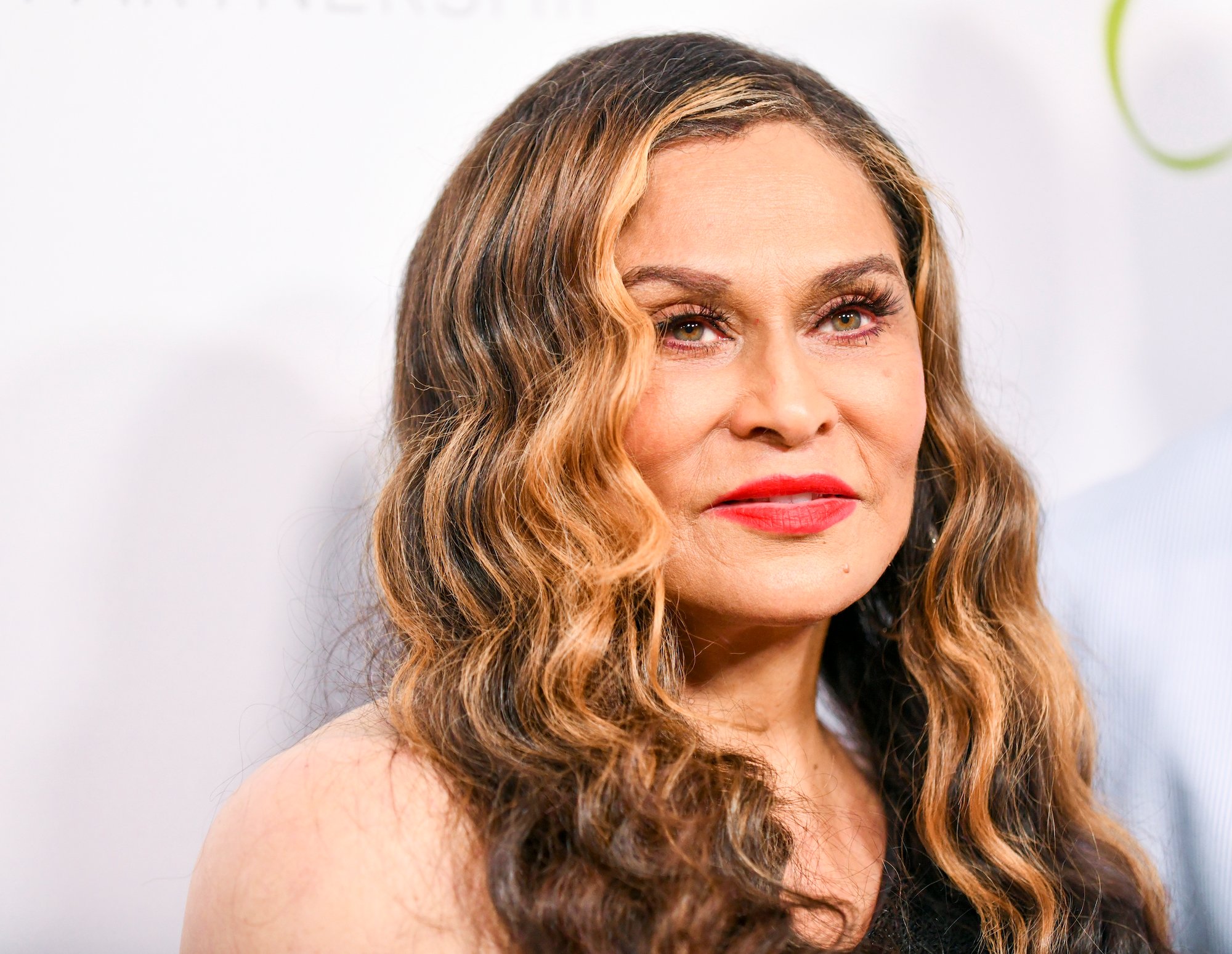 Tina Knowles-Lawson wearing red lipstick