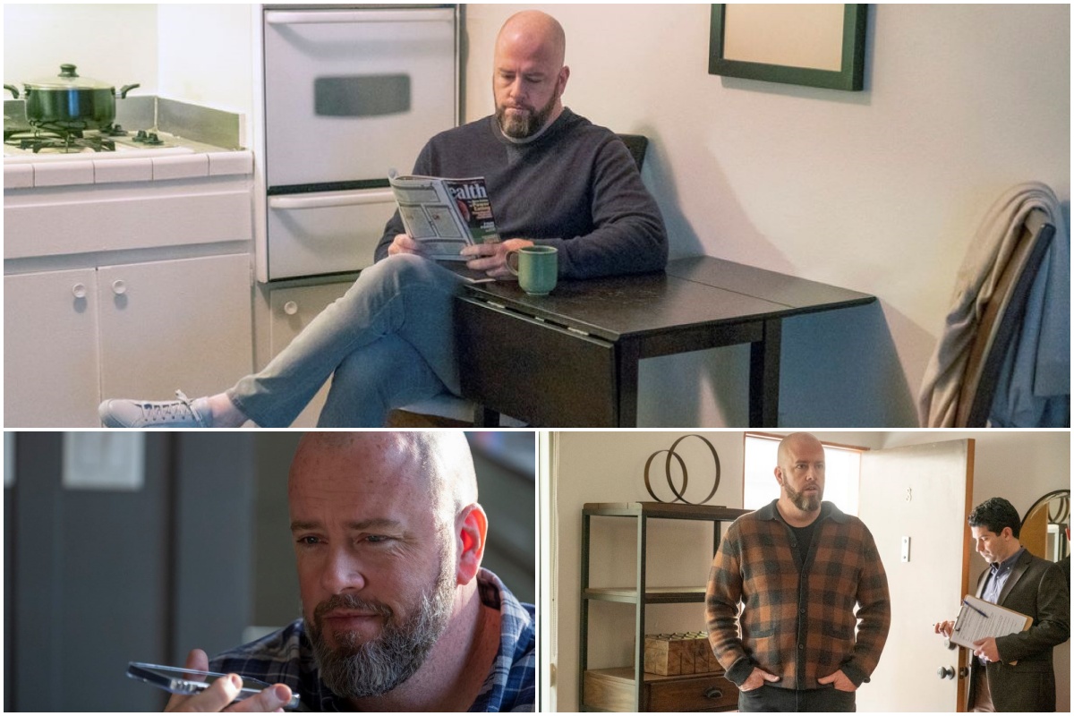'This Is Us' Season 6 Episode 12 stars Chris Sullivan as Toby. In the top photo, Toby sits at a small table in his kitchen and reads a magazine while wearing a black sweater and jeans. In the bottom left photo, Toby speaks on the phone and wears a blue and white collared plaid shirt. In the bottom right photo, Toby wears a brown plaid button-up sweater and black pants.