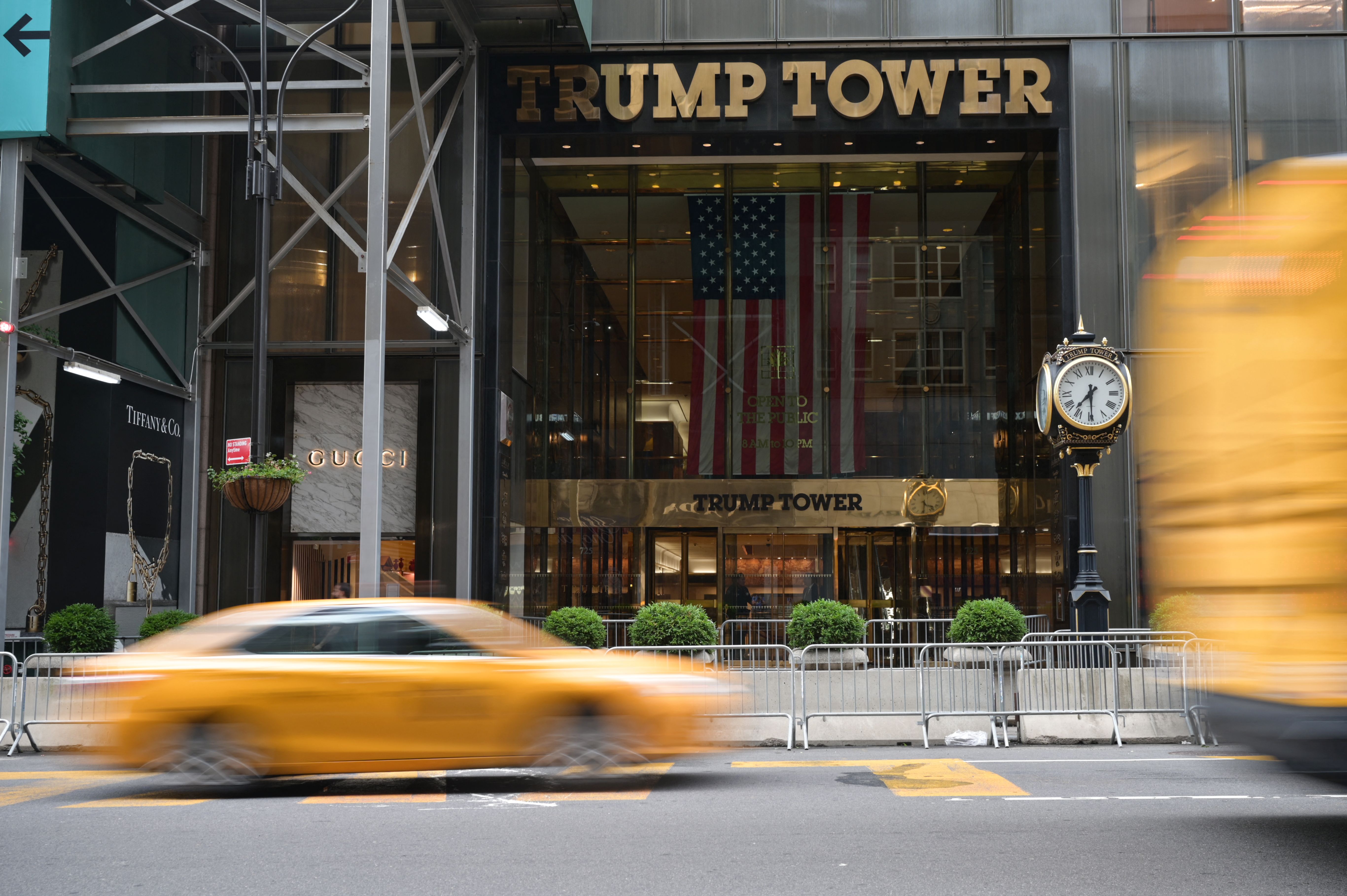 Traffic driving past the Trump Tower building in Manhattan