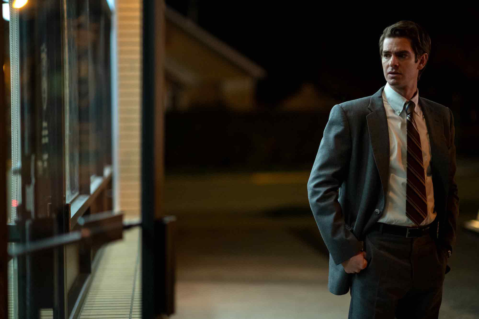 'Under the Banner of Heaven': Andrew Garfield looks to the right at an open door