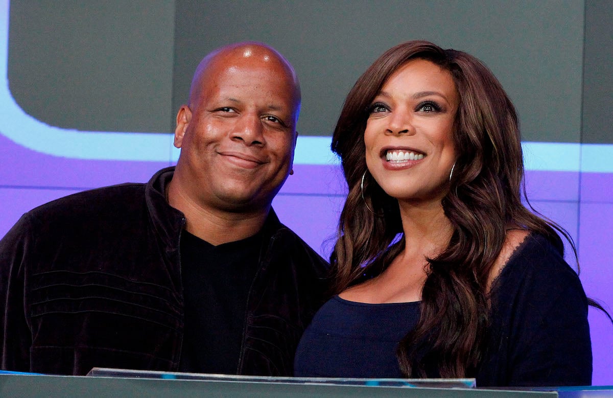 Kevin Hunter and Wendy Williams ring the opening bell at the NASDAQ MarketSite in 2010