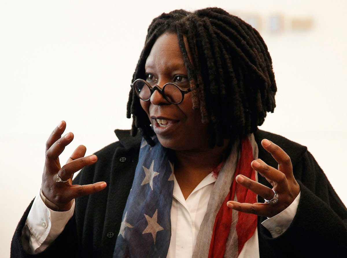 Whoopi Goldberg speaks with her hands out