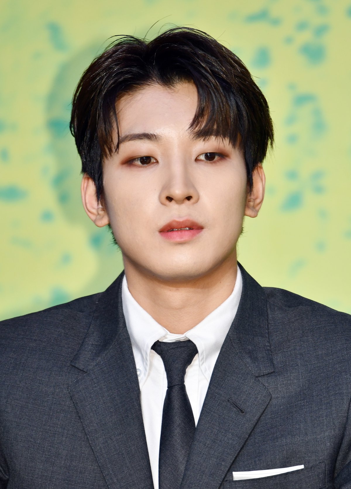 Dressed in a dark suit, Wonwoo of SEVENTEEN attends SEVENTEEN's 8th Mini Album 'Your Choice' Release Press Conference at Intercontinental Seoul Coex Harmony Ballroom in Seoul, South Korea.
