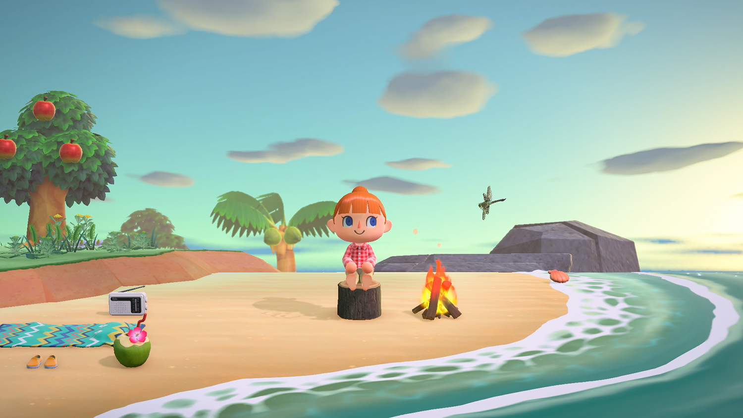 A villager sitting on the beach in Animal Crossing: New Horizons to represent May Day 2022