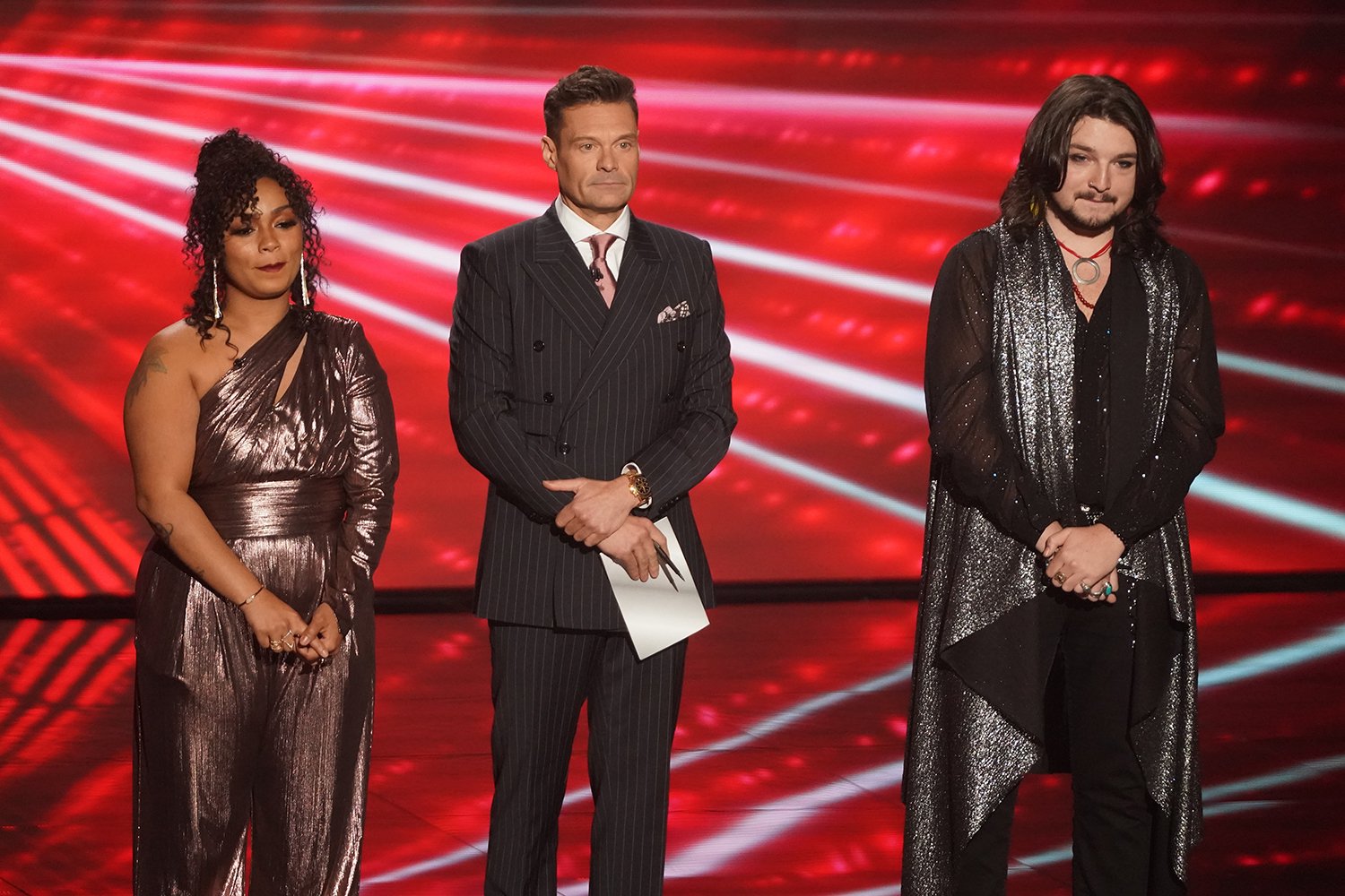 Lady K, Ryan Seacrest, and Tristen Gressett on stage on American Idol during the Top 10 results.