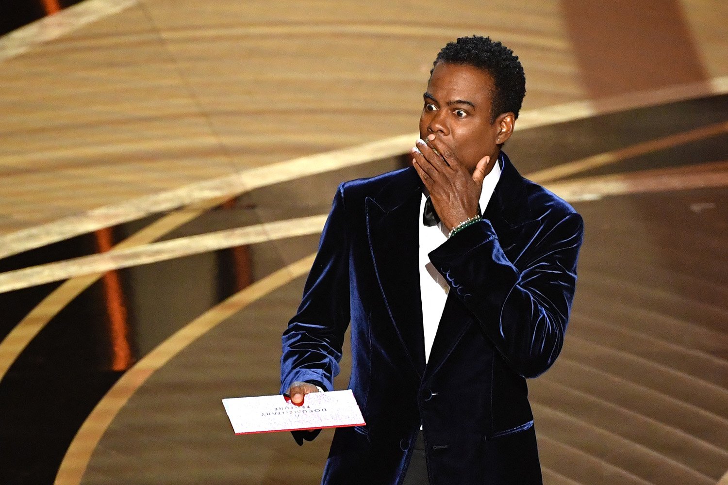 Chris Rock looks shocked at the Oscars 2022 after his joke about Jada Pinkett Smith.
