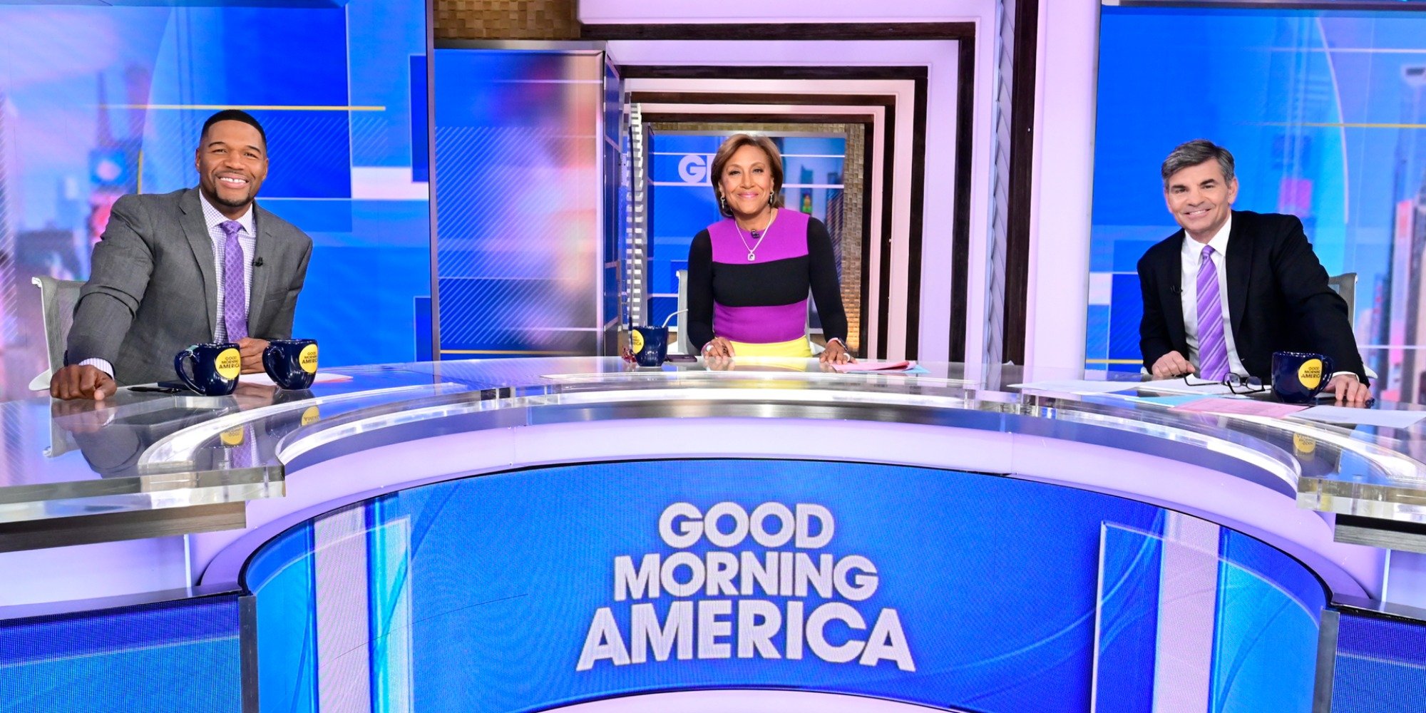 Michael Strahan, Robin Roberts and George Stephanopoulos on the Good Morning America set.