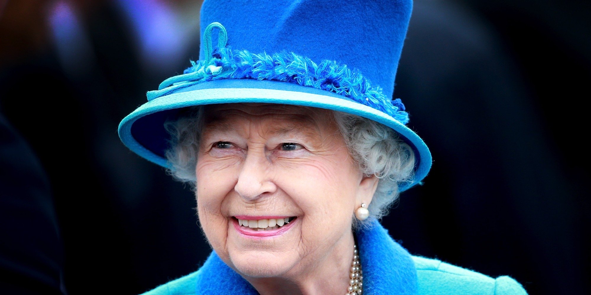 Queen Elizabeth wears a matching blue coat and hat in 2015.