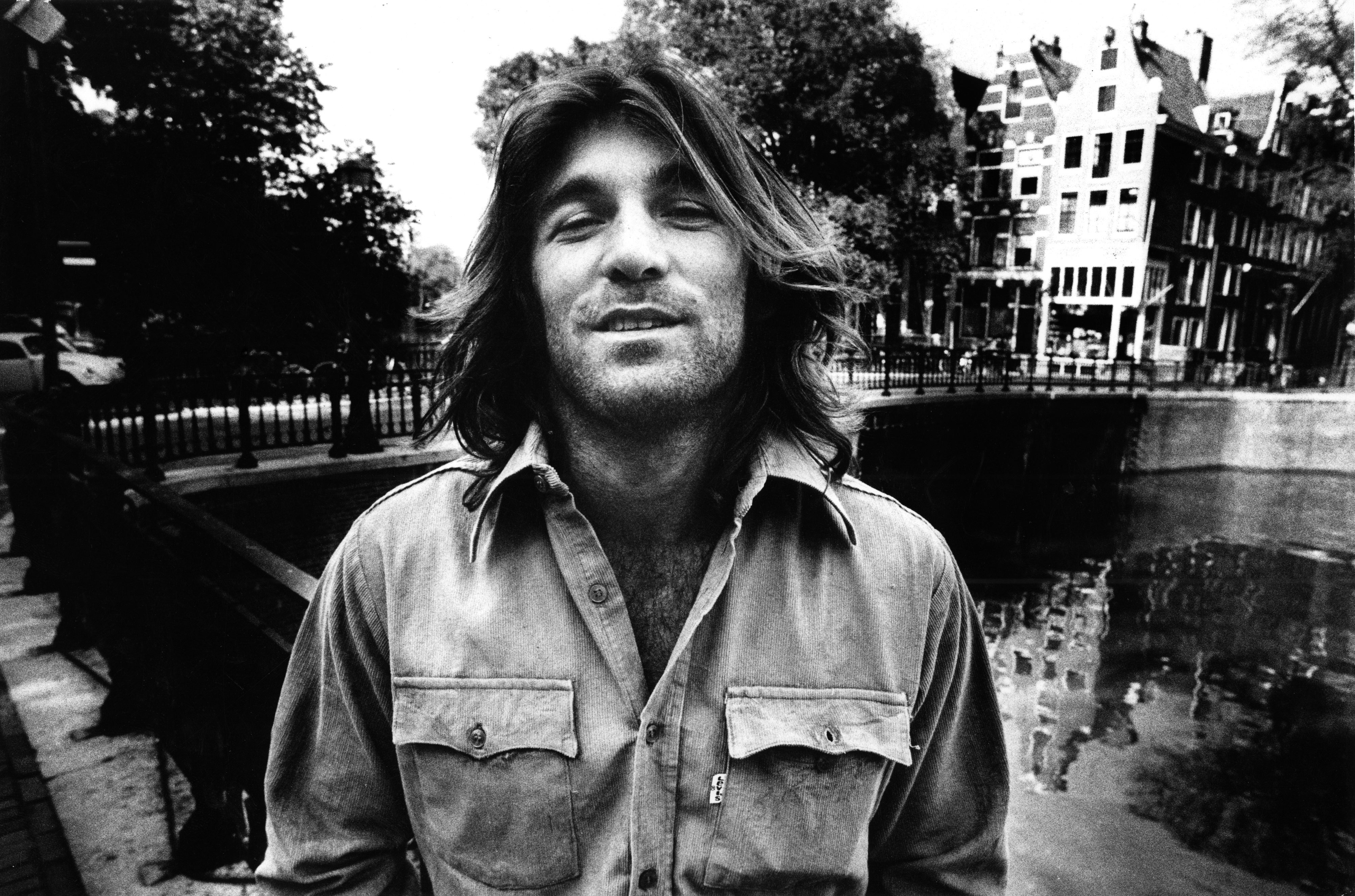 The Beach Boys' Dennis Wilson near some water