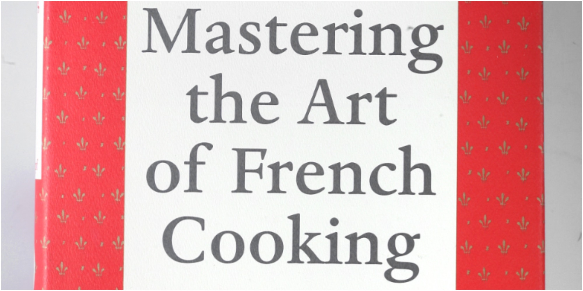 The cover art for Mastering the Art of French Cooking by Julia Child.