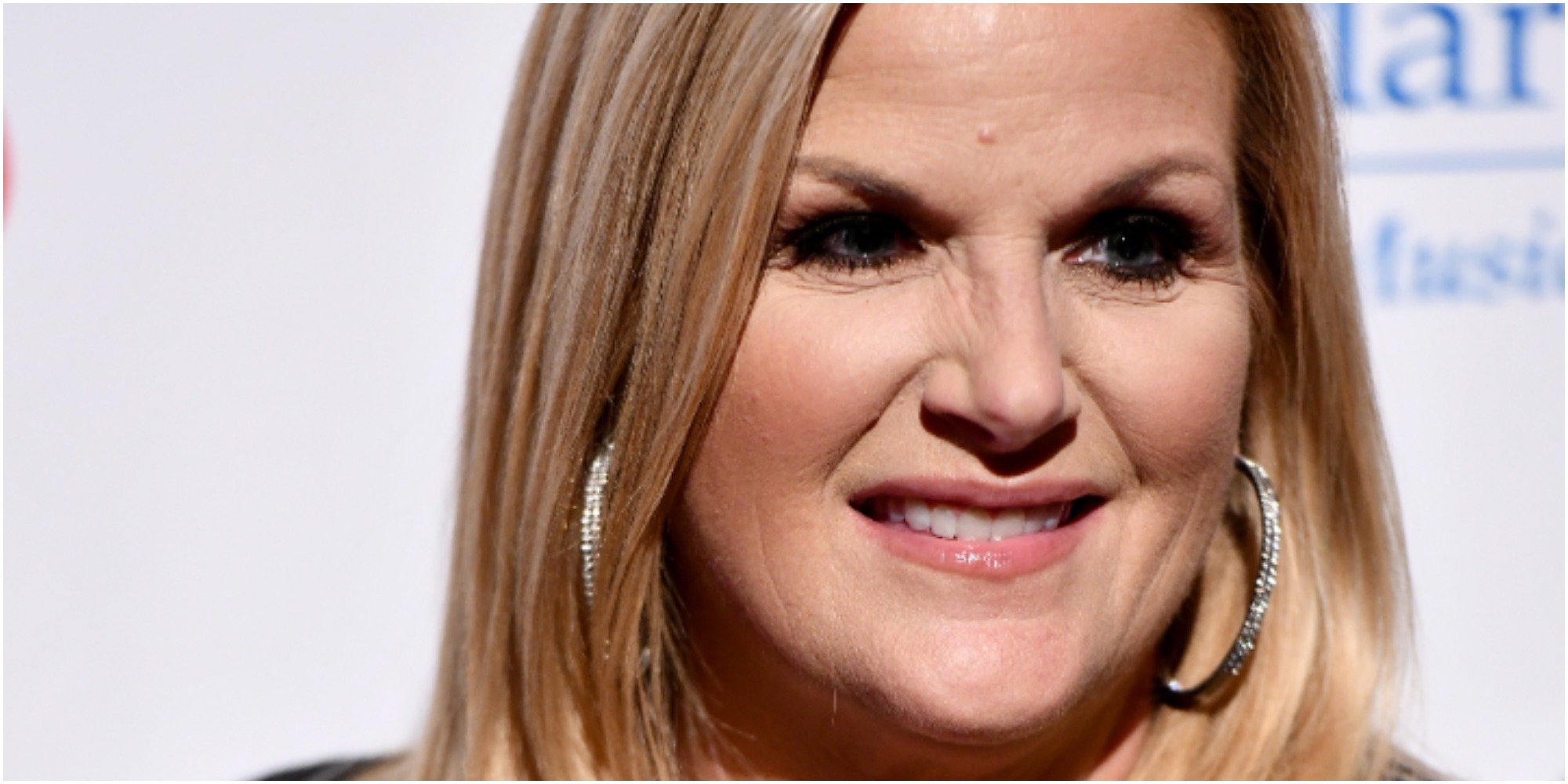 Trisha Yearwood poses on the red carpet at a press event.