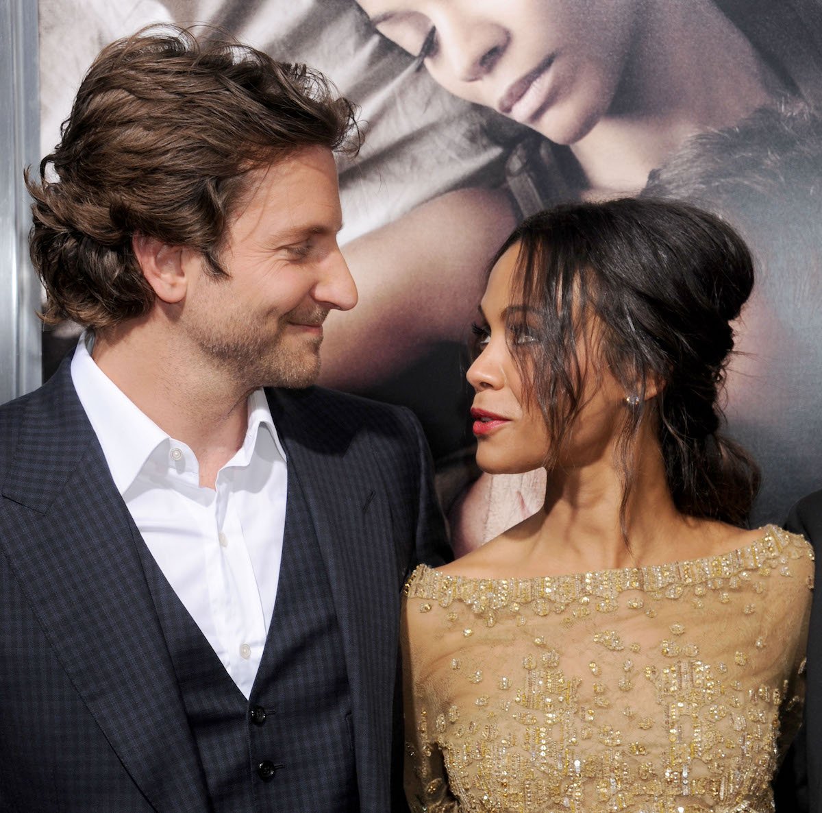 Actors Bradley Cooper and Zoe Saldana arrive at the premiere of "The Words" in 2012