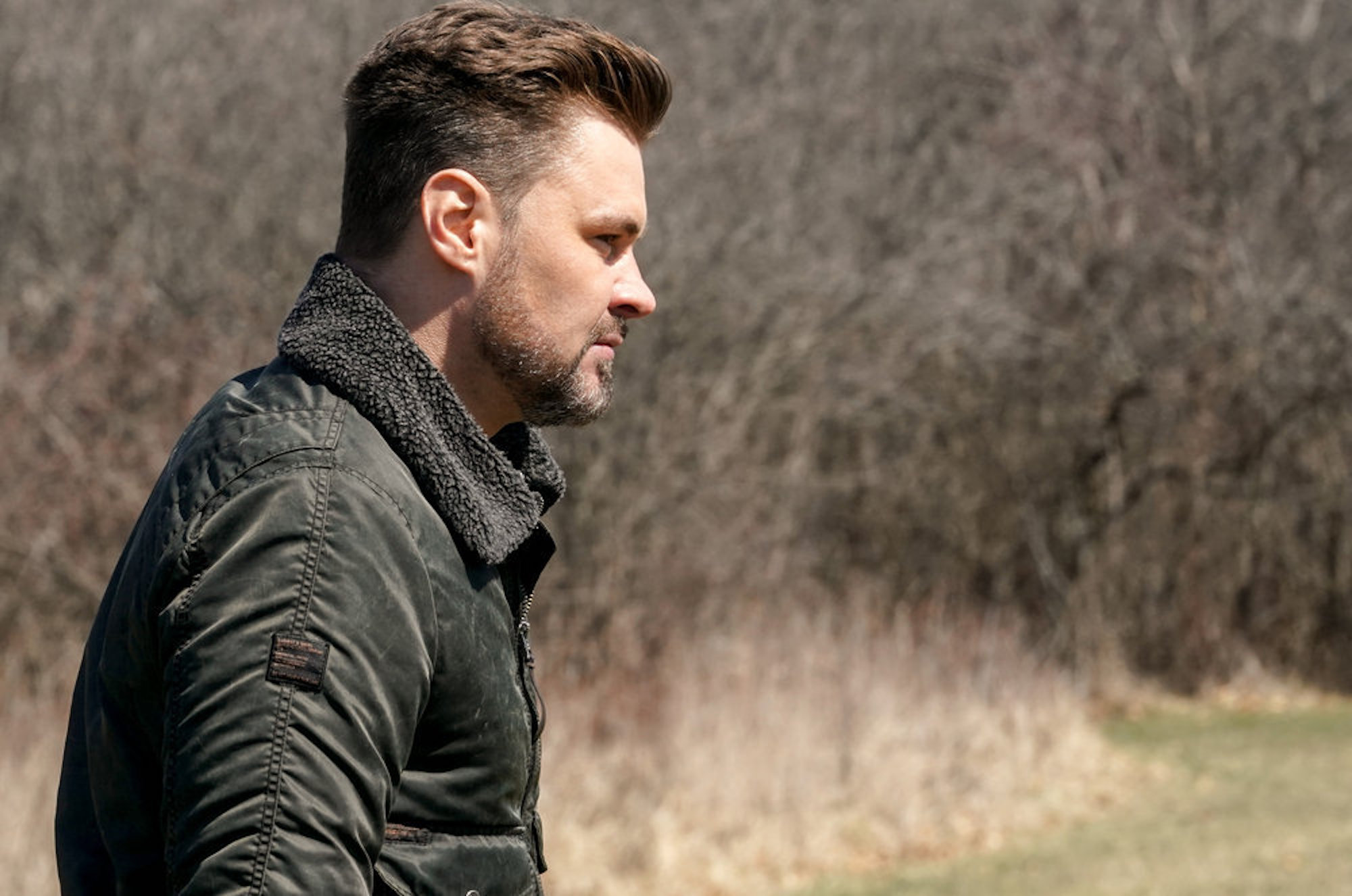 A close-up of Adam Ruzek outdoors in 'Chicago P.D.' Season 9 Episode 20