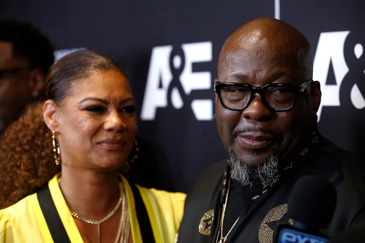 Bobby Brown and his wife Alicia Etheredge-Brown on the red carpet; Brown's wife is tired of the public talking about Brown's past marriage to Whitney Houston