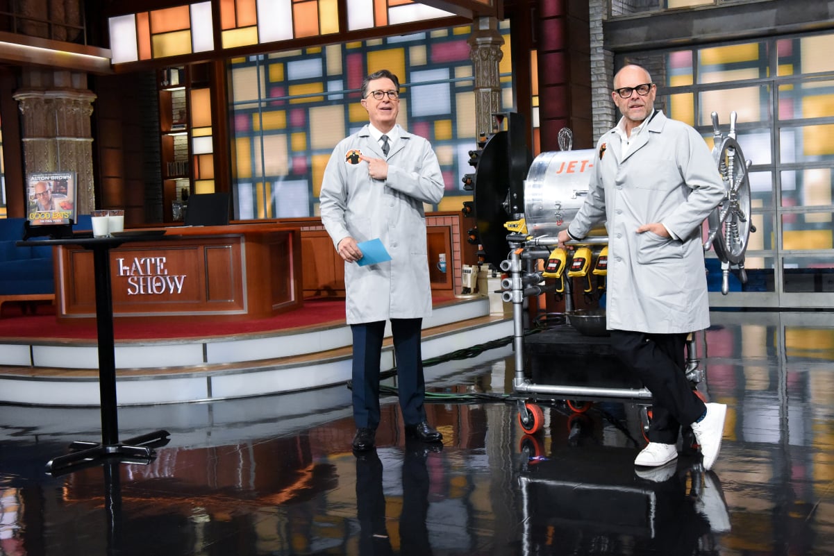 Alton Brown, right, makes an appearance on 'The Late Show with Stephen Colbert.' He is pictured here with the host and both are wearing lab coats in an over-the-top recipe demonstration of Brown's.