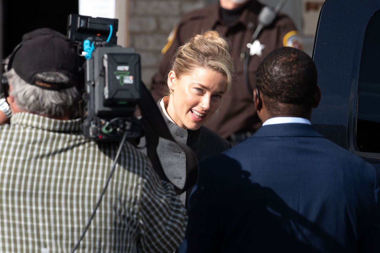 Amber Heard exits the courthouse during her defamation trial vs. Johnny Depp. Heard's privacy is all but gone, and the trial could have a negative ripple effect for victims of abuse.