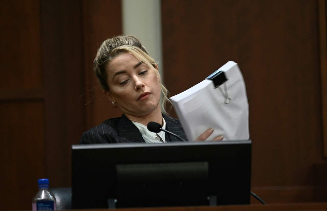 Amber Heard sits for court testimony