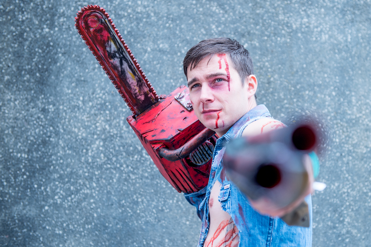 A cosplayer as the Bruce Campbell character Ash from ‘Evil Dead’ poses