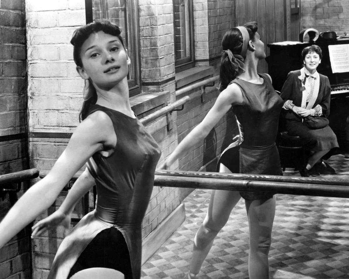 Audrey Hepburn rehearsing at the barre, in black and white, 1950