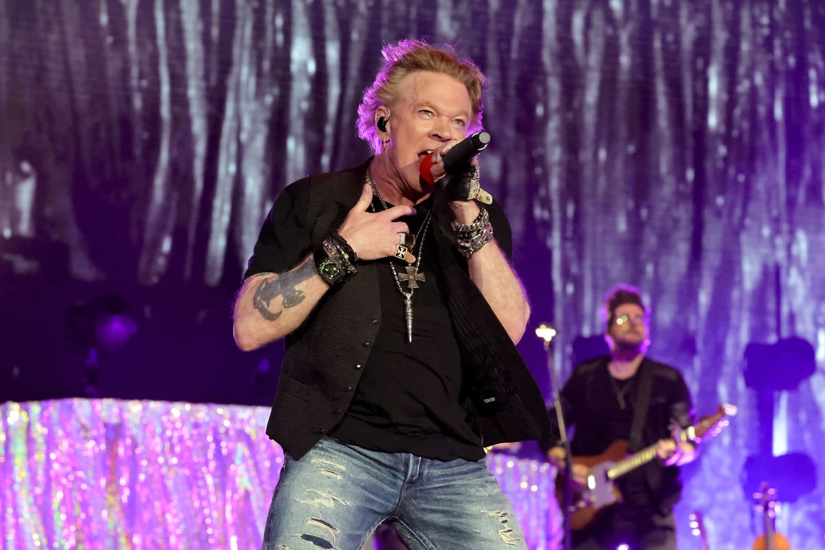 Wearing a black shirt and vest Axl Rose performs on stage at the Stagecoach Festival in Indio, CA.