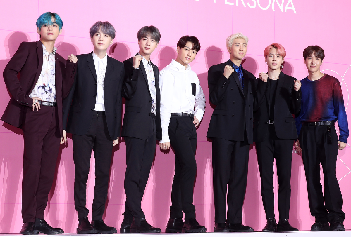 BTS, featured in Korea: Cubically Inspired, pose at the Map of the Soul Persona press conference