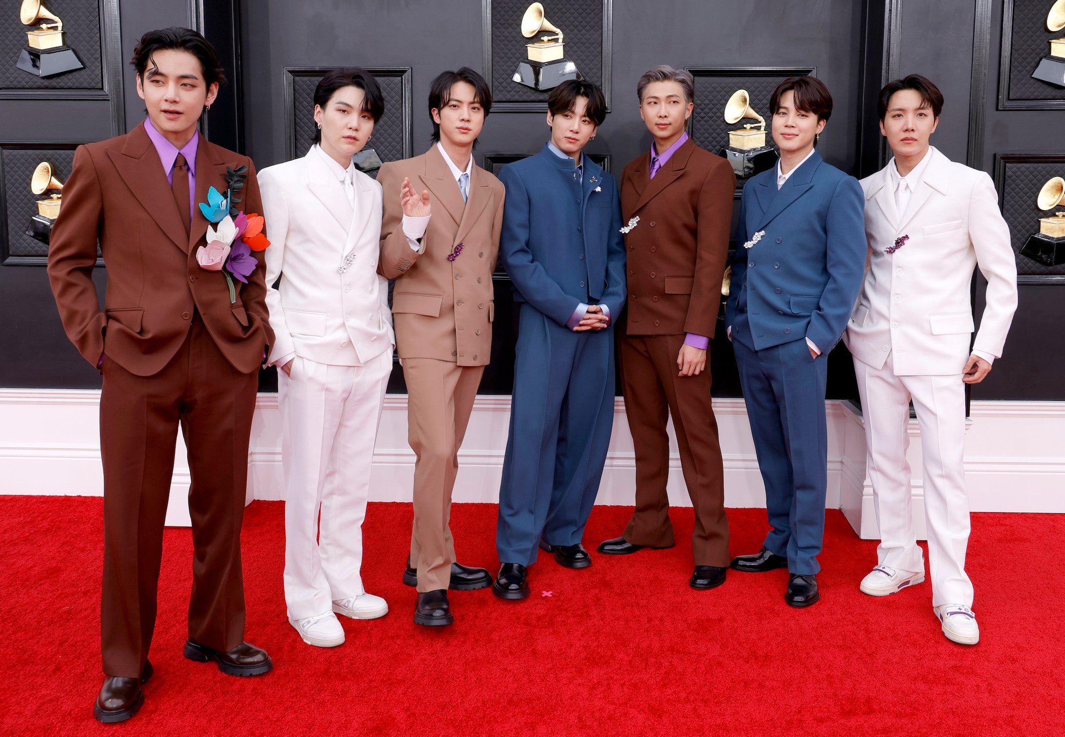 V, Suga, Jin, Jungkook, RM, Jimin, and J-Hope of BTS attend the 64th Annual GRAMMY Awards