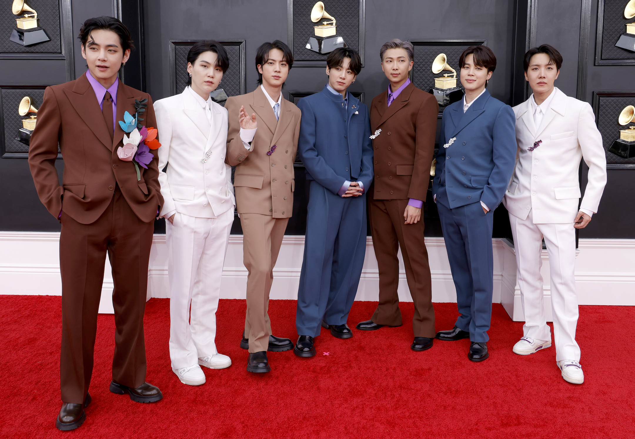 V, Suga, Jin, Jungkook, RM, Jimin, and J-Hope of BTS attend the 64th Annual GRAMMY Awards