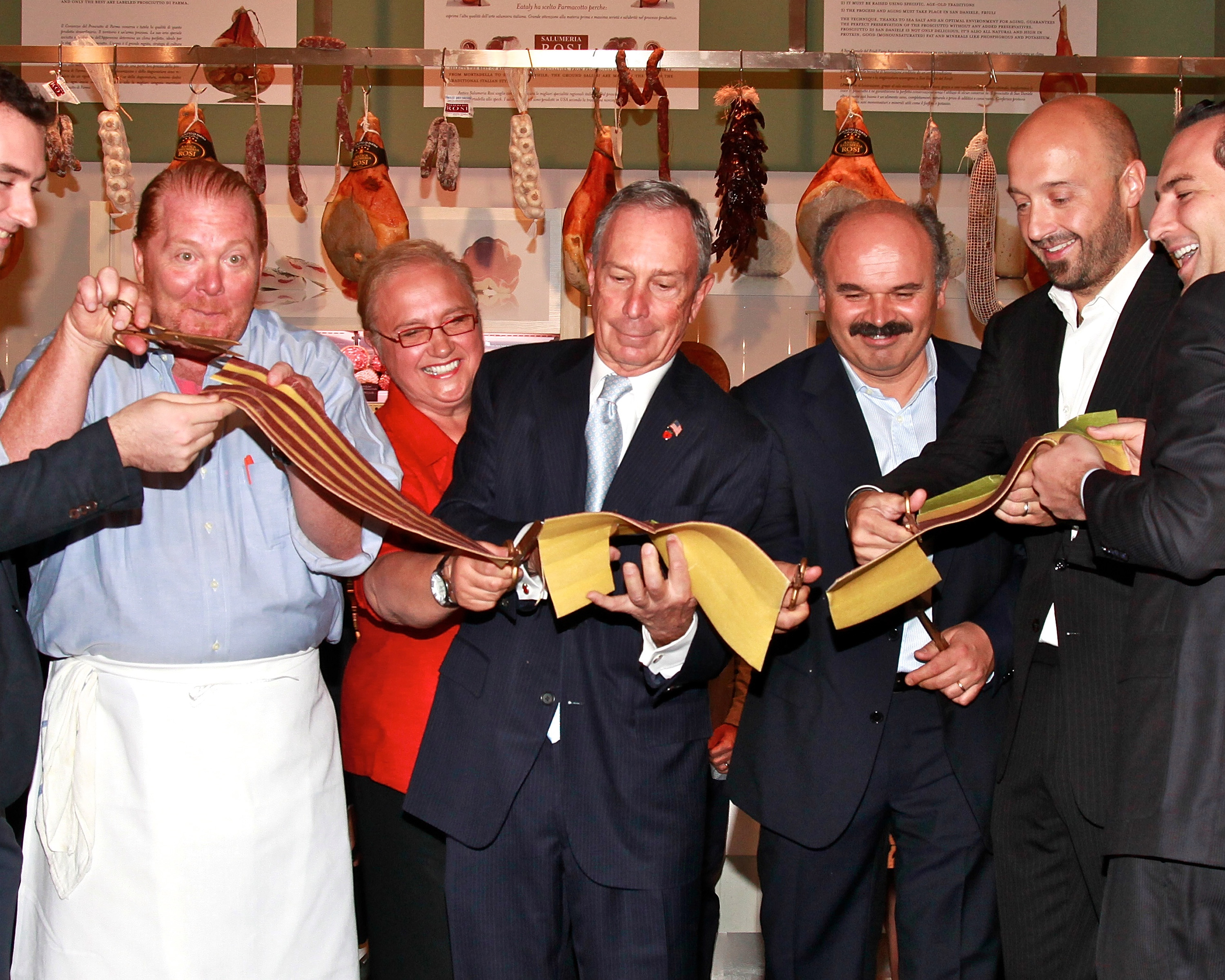 Mario Batali, Lidia Bastianich, Michael Bloomberg, Eataly founder Oscar Farinetti and Joseph Bastianich cut a pasta ribbon at Eataly's grand opening on August 31, 2010
