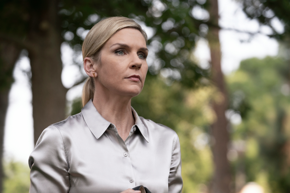 Rhea Seehorn as Kim Wexler in the Better Call Saul episode Plan and Execution. Kim wears a silver button-up top. 