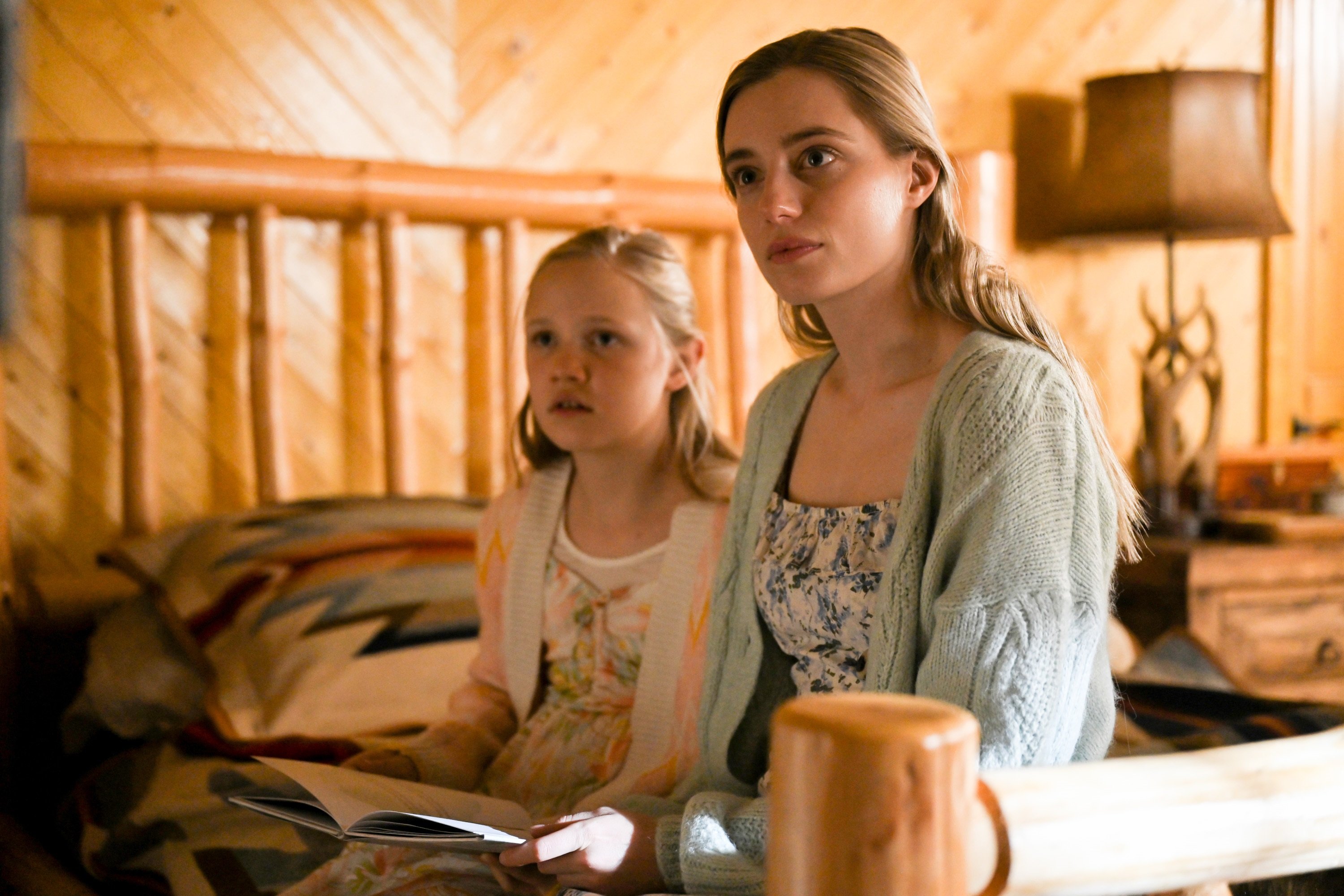 'Big Sky' Zoe Baker and Anja Savcic sit together on a bed
