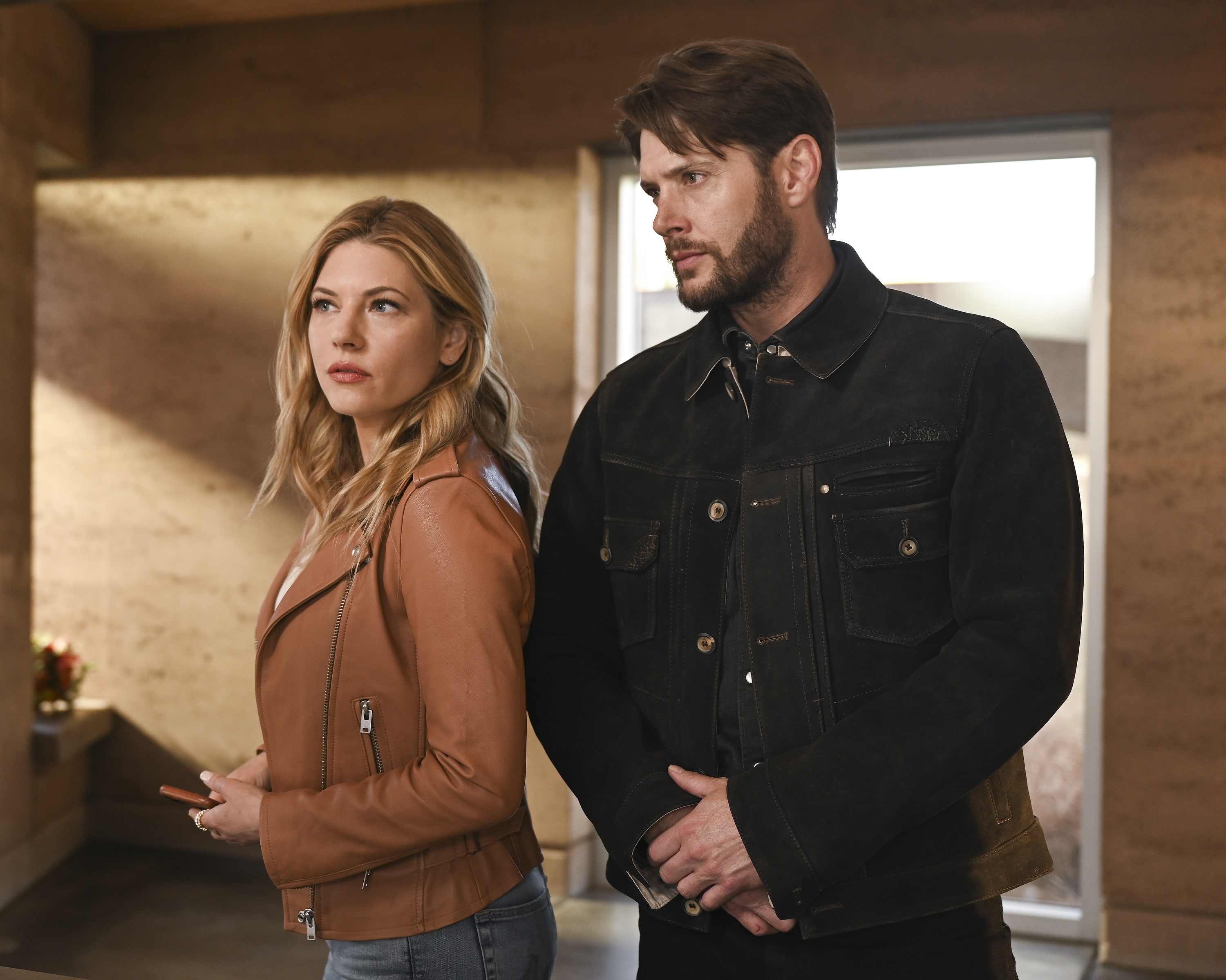 'Big Sky' Season 2 cast Katheryn Winnick as Jenny Hoyt and Jensen Ackles as Sheriff Beau Arlen standing guard together