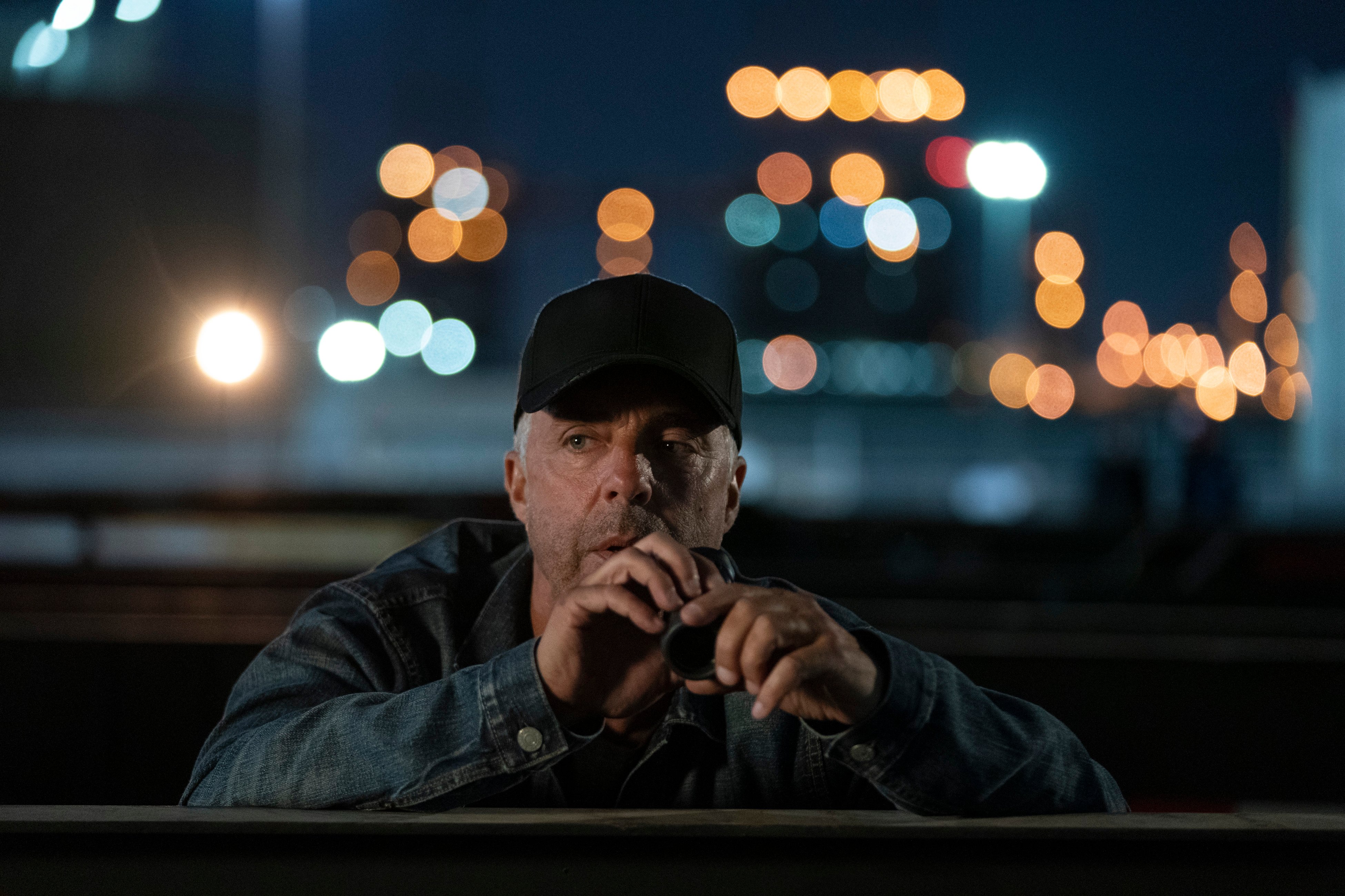 Titus Welliver as Harry Bosch, wearing a black baseball cap, in 'Bosch: Legacy'