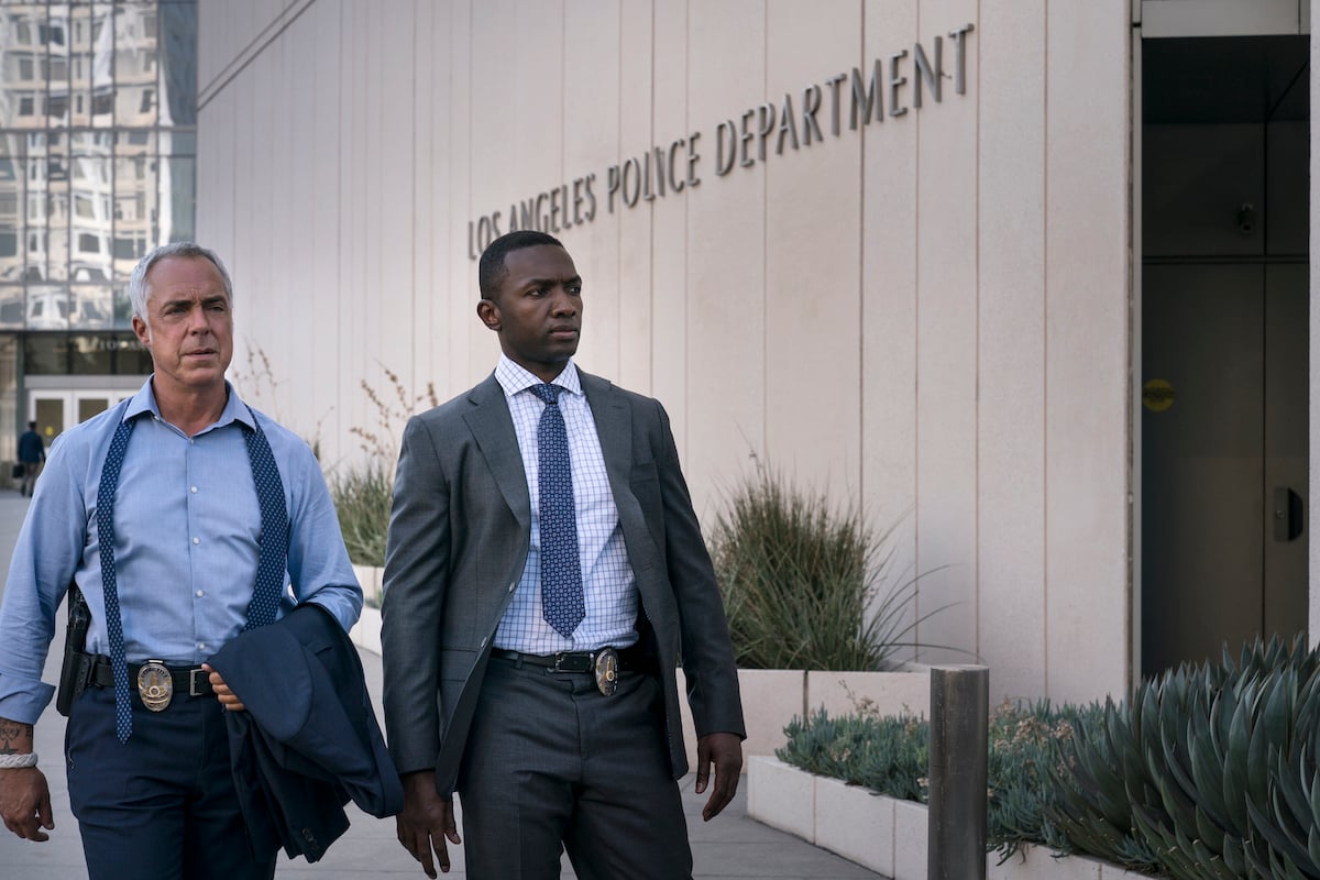Titus Welliver as Harry Bosch and Jamie Hector as Jerry Edgar outside LAPD headquarters in 'Bosch'