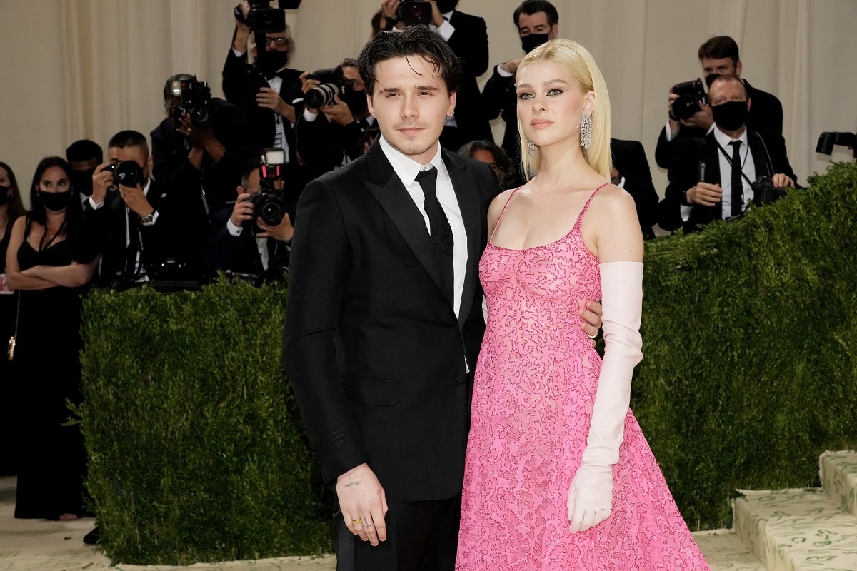 Brooklyn Beckham and Nicola Peltz, who had a starter a home in Beverly Hills, pose for photos at The 2021 Met Gala