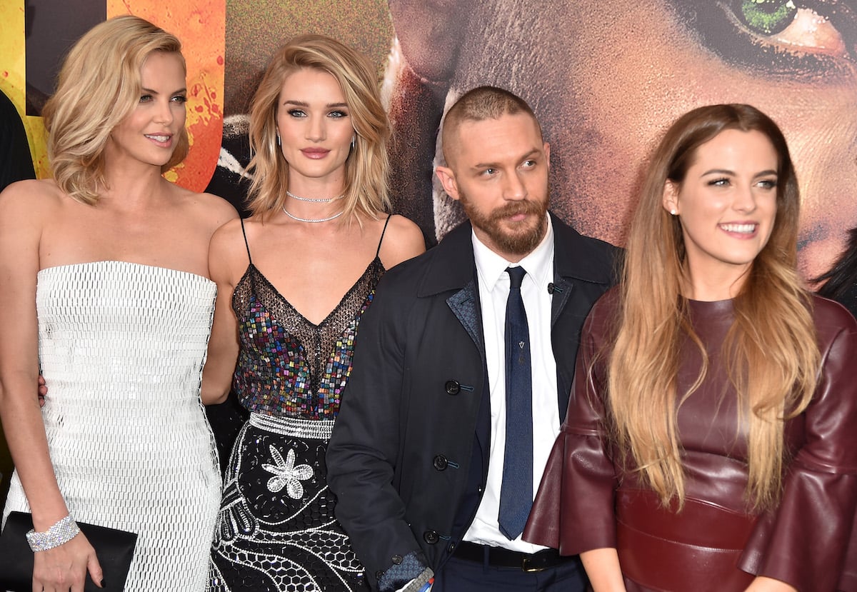 Actors Charlize Theron, Rosie Huntington-Whiteley, Tom Hardy, and Riley Keough attend the premiere of Mad Max: Fury Road